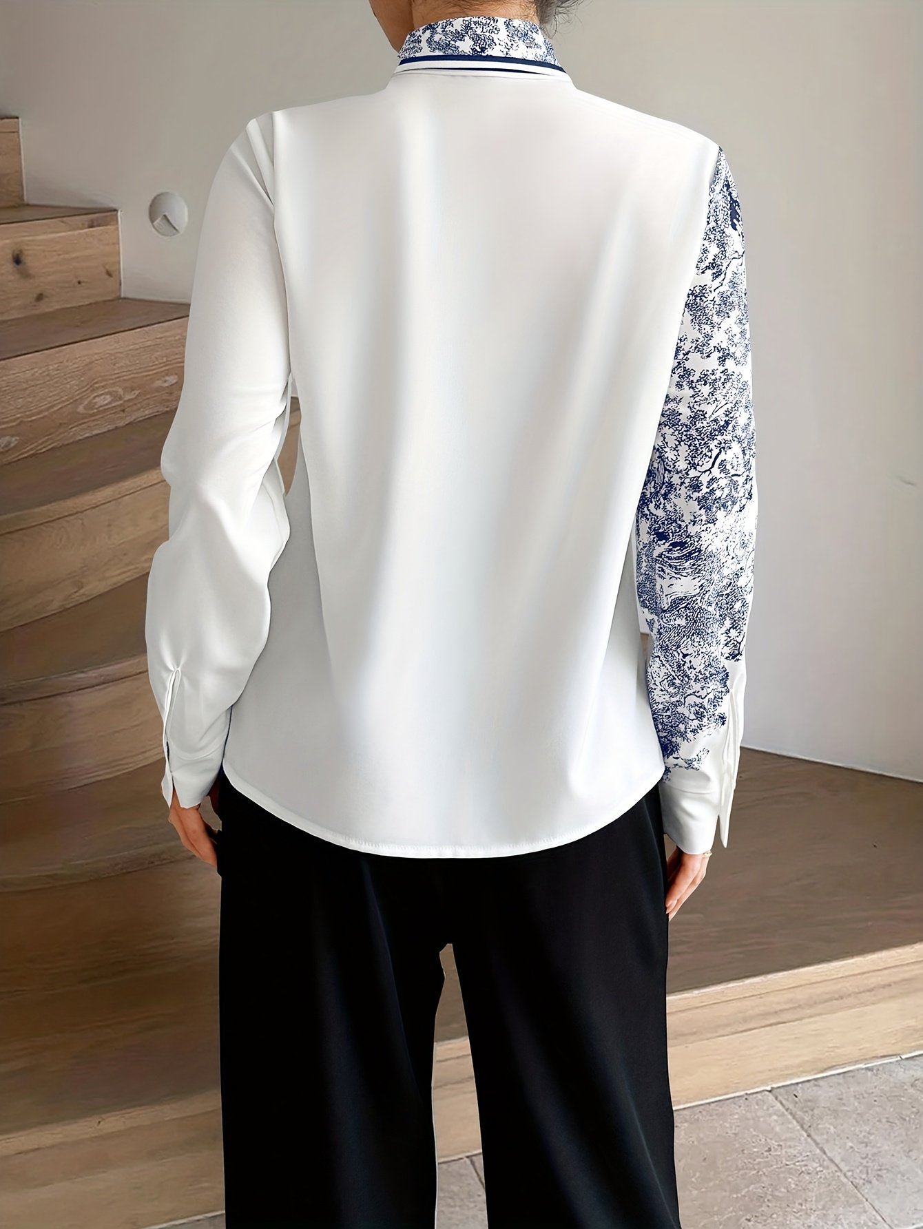 חולצת אלגנטיות קיצית: גזרה אופנתית עם נגיעה אמנותית – תמונה 9