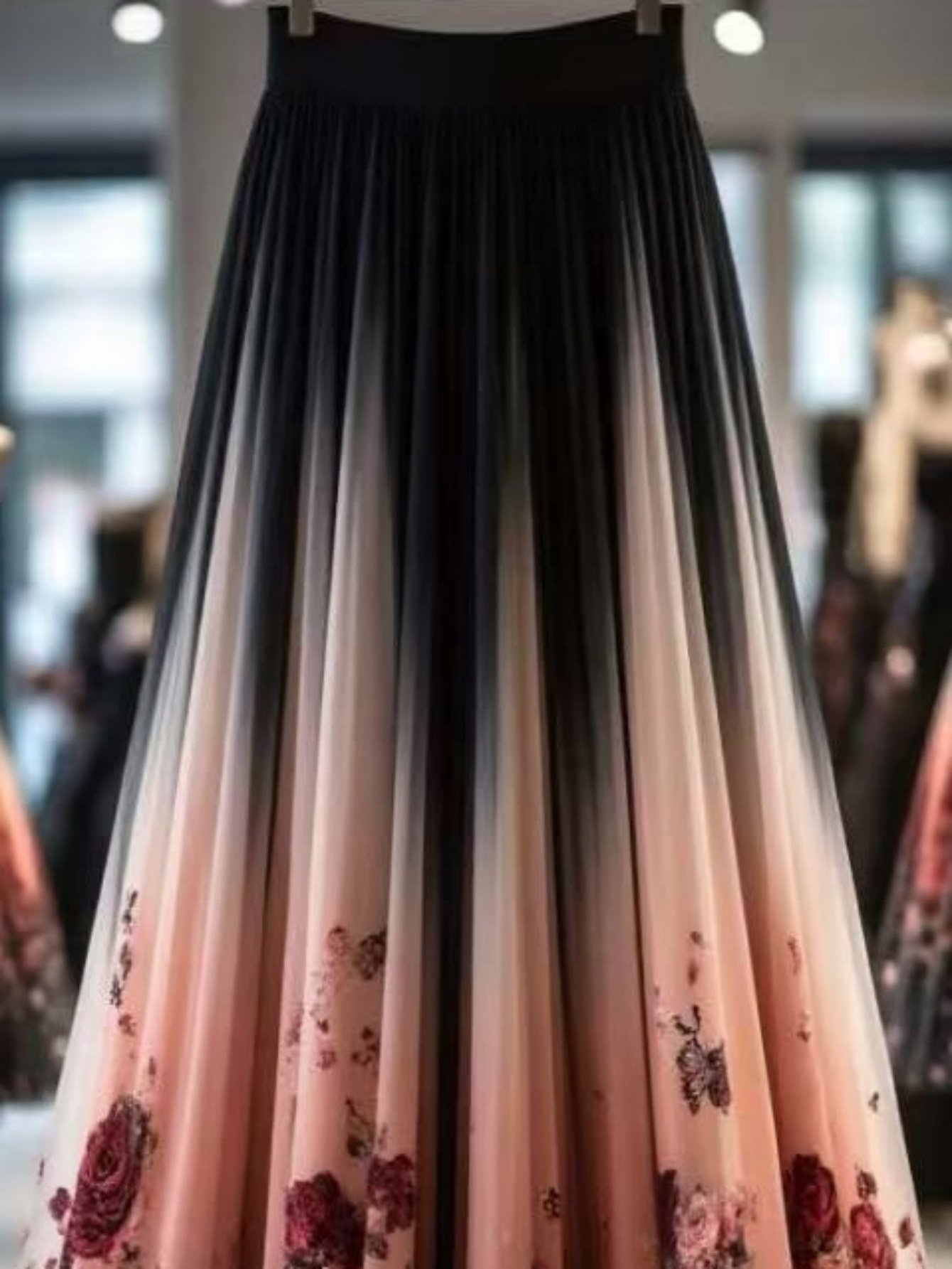 זוהרת בכל אירוע: חצאית מקסי עם הדפסי פרחים ופרטי רשת קסומים – תמונה 2