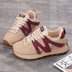 أناقة عصرية وراحة لا تضاهى: حذاء رياضي نسائي بتصميم الألوان المتداخلة