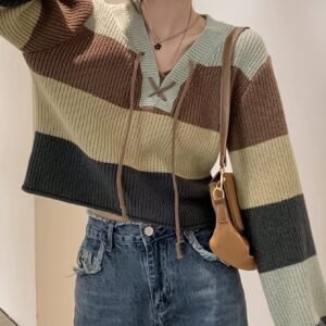 أناقة الدفء المخططة: بلوفركِ العصري لكل إطلالة!