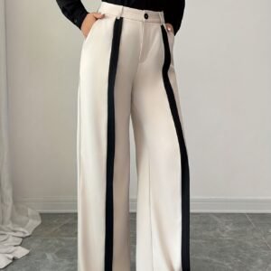 بنطال الأناقة الواسعة: إطلالة متكاملة لكل سيدة