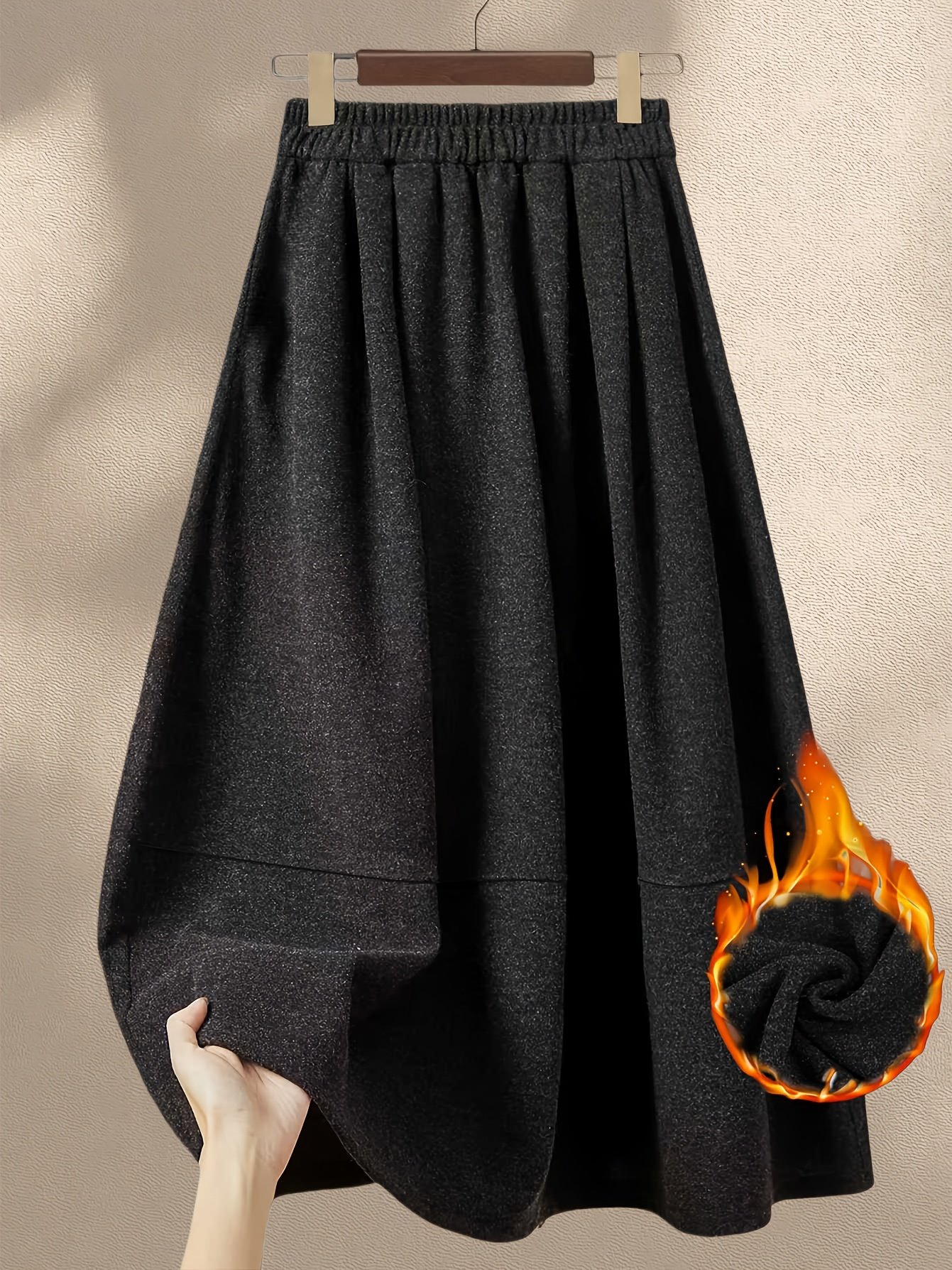 התחממי בסטייל: חצאית חורף רחבה בגזרת A עם מותן גומי! – תמונה 5