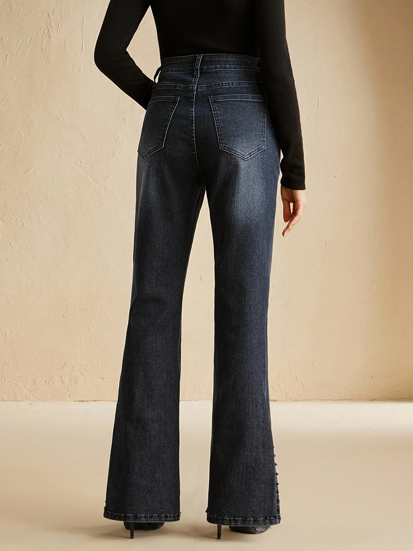 Chic Revived Denim: High-Waisted Wide-Leg Jeans with Unique Side Slit