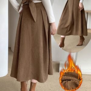 تألقي بلمسة ساحرة: تنورة الخصر العالي البليسيه الأنيقة!