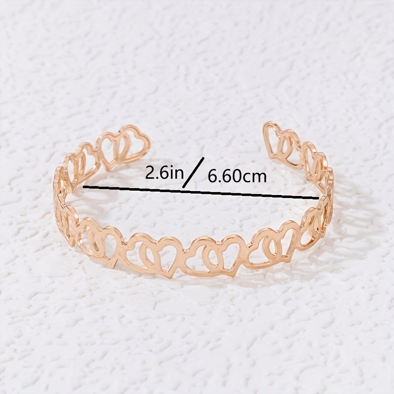 אלגנטיות מתחדשת: צמיד לב זהב חלול למראה בלתי נשכח – תמונה 5