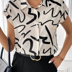 بلوزة الأناقة الهندسية: إشراقة عصرية لكل امرأة!