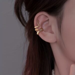 أقراط الثعبان العظمية: لمسة فخامة تعانق أسلوبك الفريد