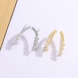 أقراط الأذن النجمية الذهبية: لمسة تألق خالدة!