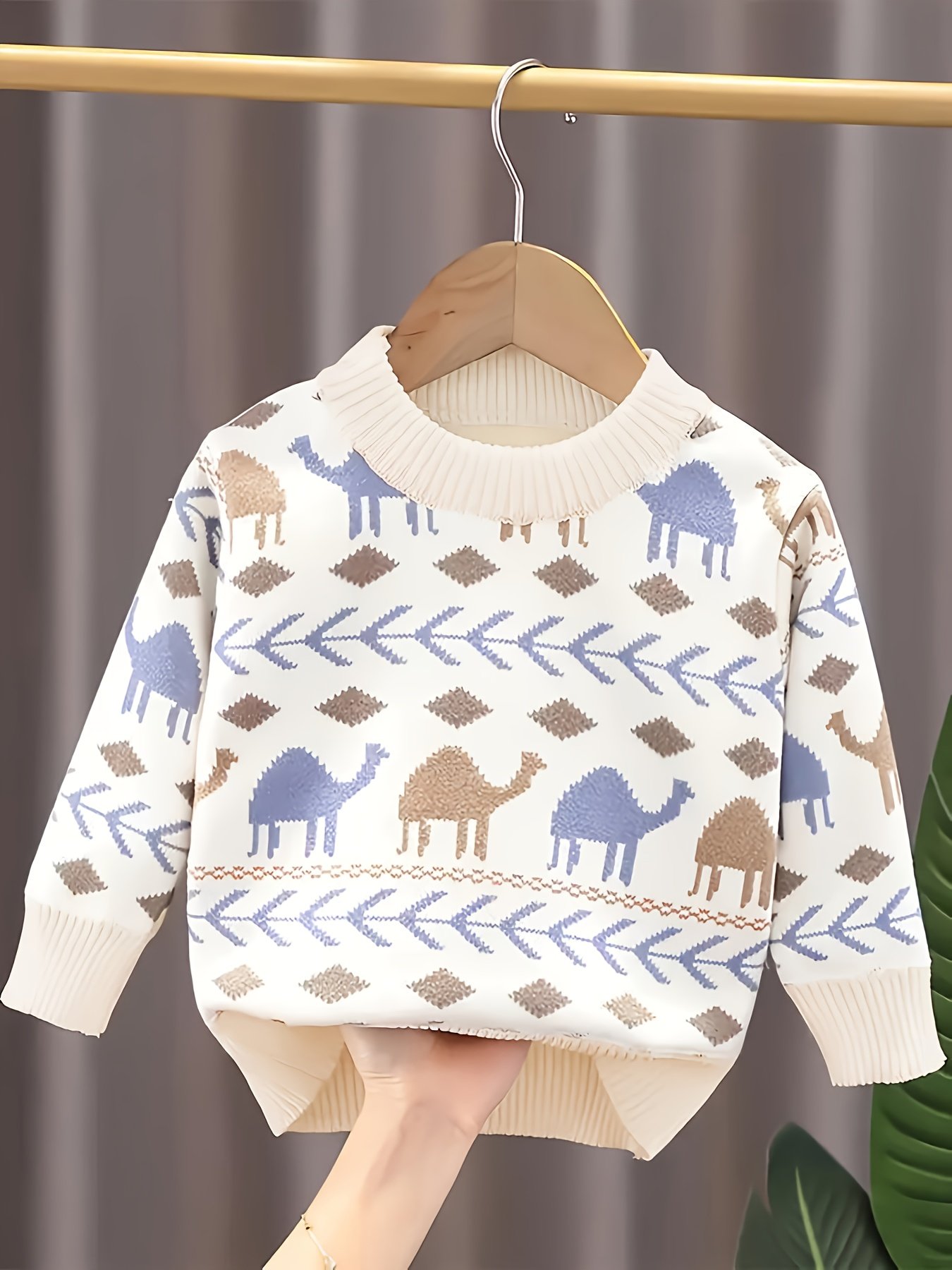 دفء الشتاء بلمسة عصرية: سترة الأولاد بتصميم هندسي أنيق!