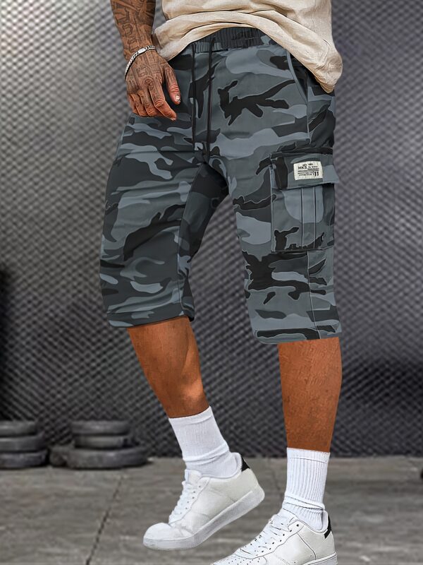 A Pair of Mid to Long Casual Pants with a Camouflage Pattern, Featuring Large Pockets And Patched Pockets with Tags. The Waist Has a Drawstring Design. - Image 6