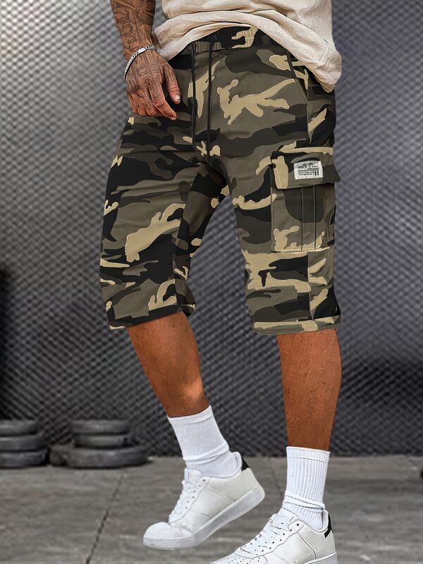 A Pair of Mid to Long Casual Pants with a Camouflage Pattern, Featuring Large Pockets And Patched Pockets with Tags. The Waist Has a Drawstring Design. - Image 5