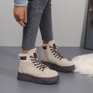 بوتات الشتاء الفاخرة: أناقة دافئة لكل خطوة