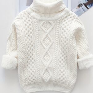 كنزة أبطالك الصغار الشتوية: دفء استثنائي، أناقة لا تُضاهى!