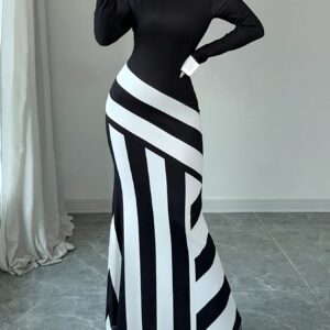 فستان حورية البحر الساحر: أناقة هندسية بالأسود والأبيض بقصة ضيقة لمناسباتكِ الخاصة