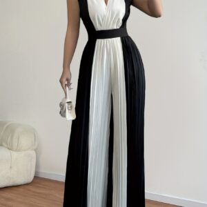 تألقي بأناقة فريدة: جامبسوت صيفي بتصميم الكولور بلوك